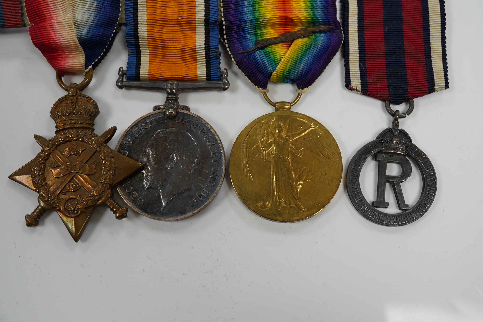 A Great War trio with oakleaf to Assistant Matron B.J.D.Reid, Queen Alexandra's Imperial Military Nursing Service with Royal Red Cross medal and Military Nursing Service Reserve Badge (5)